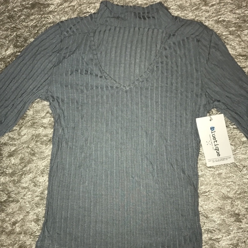 Light blue/ grey shirt